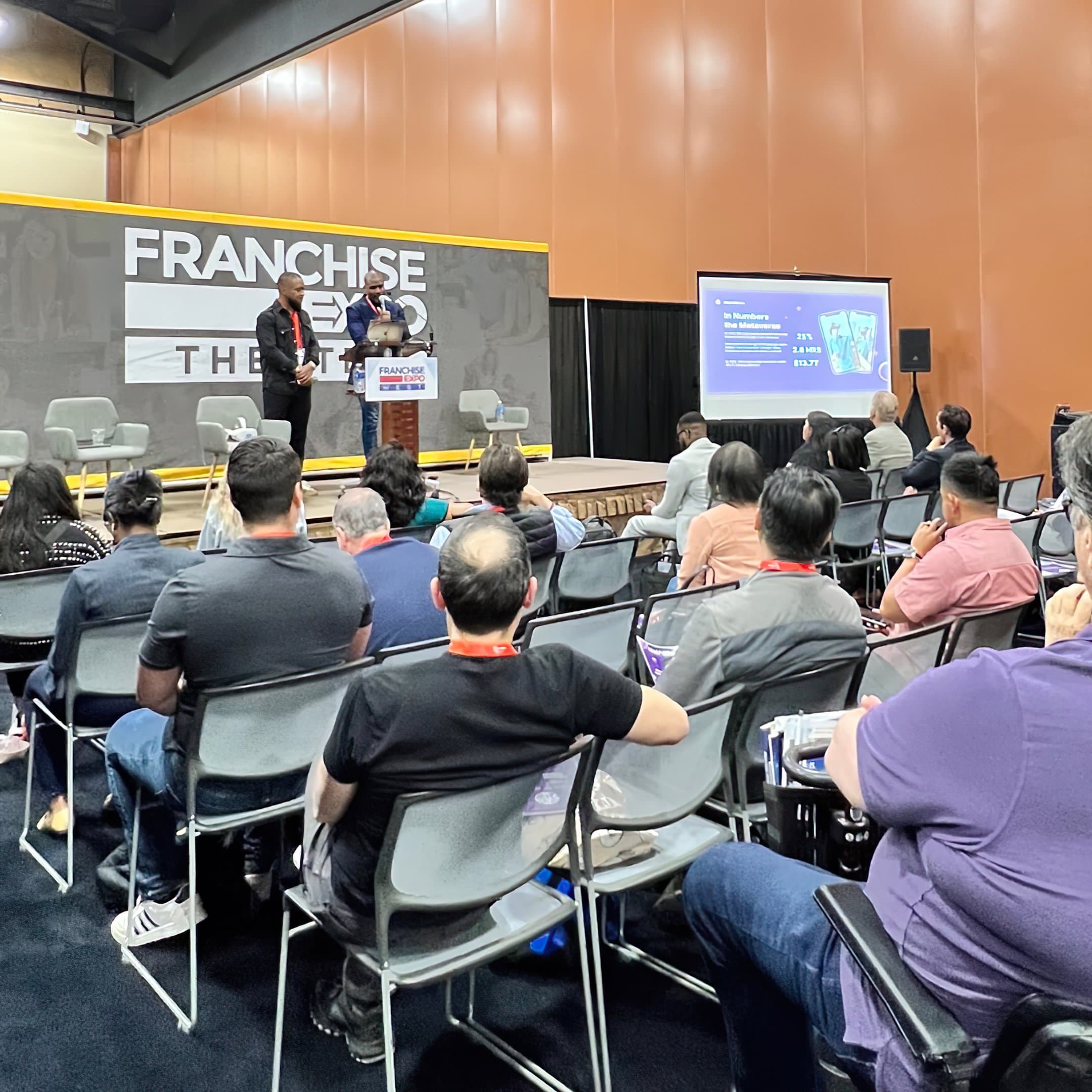 MetAiBlock presenting AI workflow strategies at the International Franchise Expo